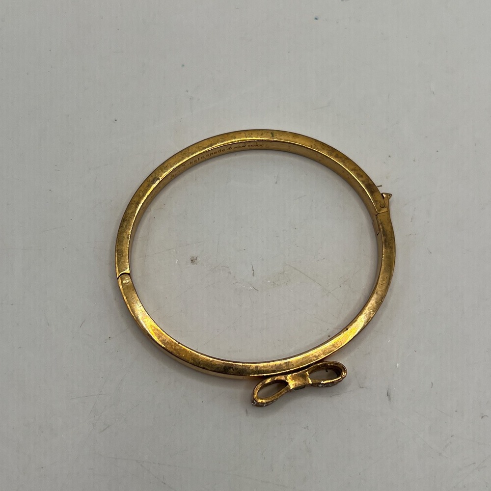 Kate Spade New York Gold Tone Pave Crystal Bow Hinged Bangle Bracelet